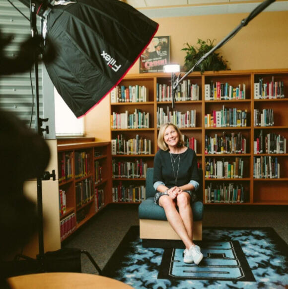 Team Locals client sits in position for a filming project